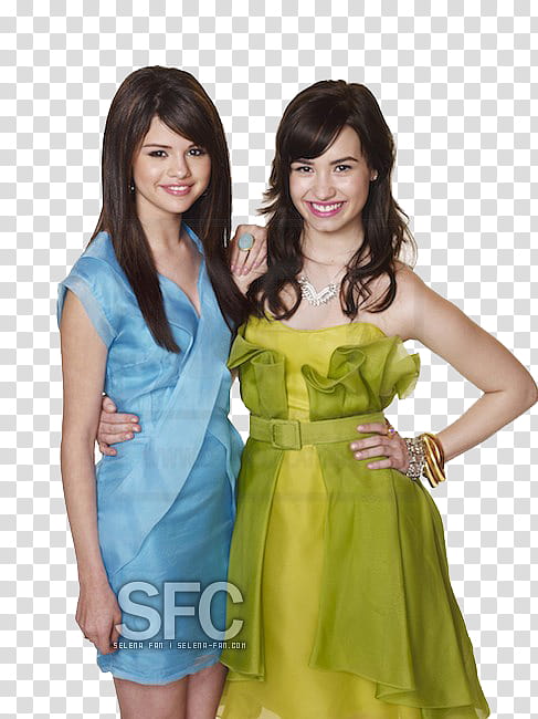 Selena Gomez in blue surplice neckline dress standing beside woman in green and yellow tube dress transparent background PNG clipart