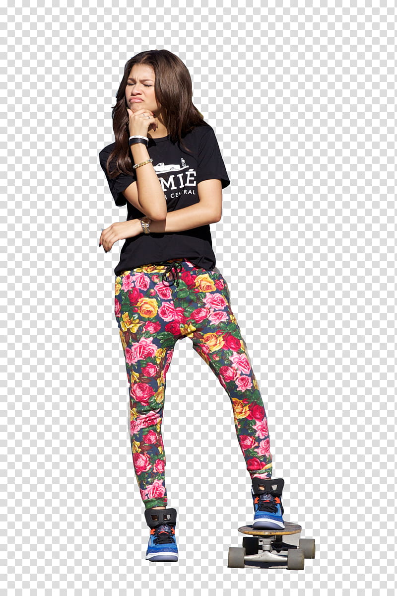 Zendaya Coleman, frowning woman wearing black shirt and floral pants with skateboard in left foot transparent background PNG clipart