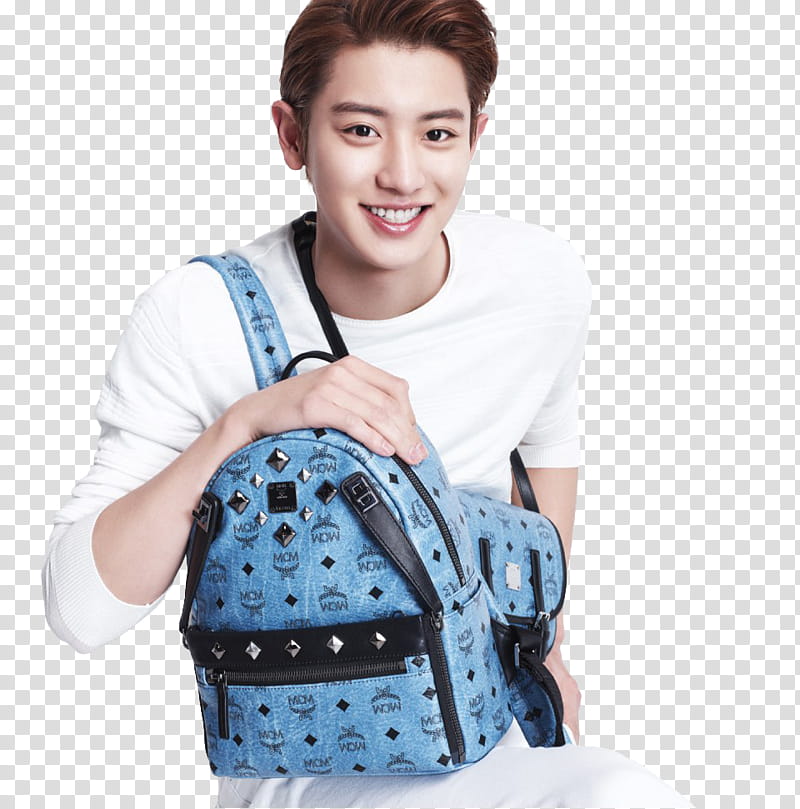EXO, smiling man holding blue MCM back transparent background PNG clipart