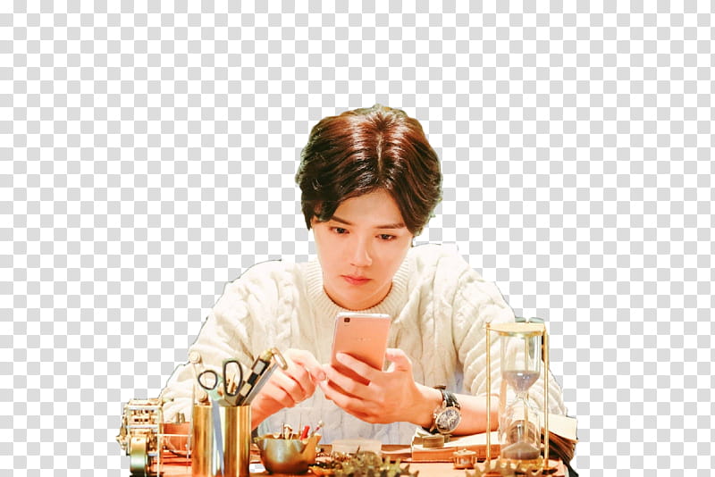 Luhan, person holding rose gold iPhone s while leaning on table transparent background PNG clipart