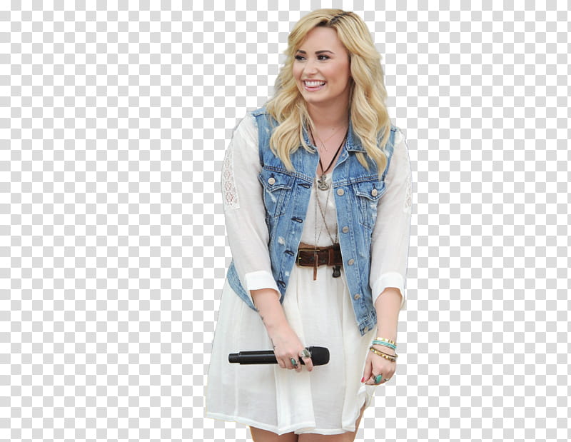 Demi Lovato , woman in blue denim button-up vest holding black microphone transparent background PNG clipart