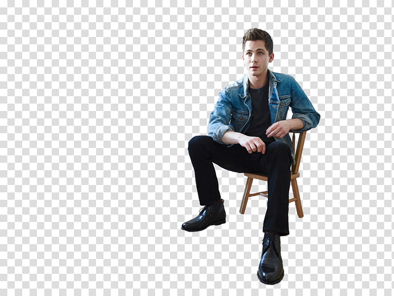 Logan Lerman, man sitting on brown chair transparent background PNG clipart