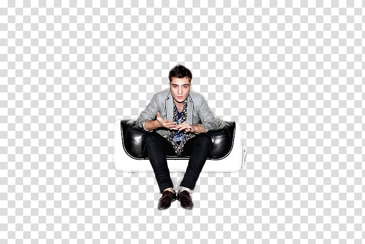 Ed Westwick, man sitting on black couch transparent background PNG clipart