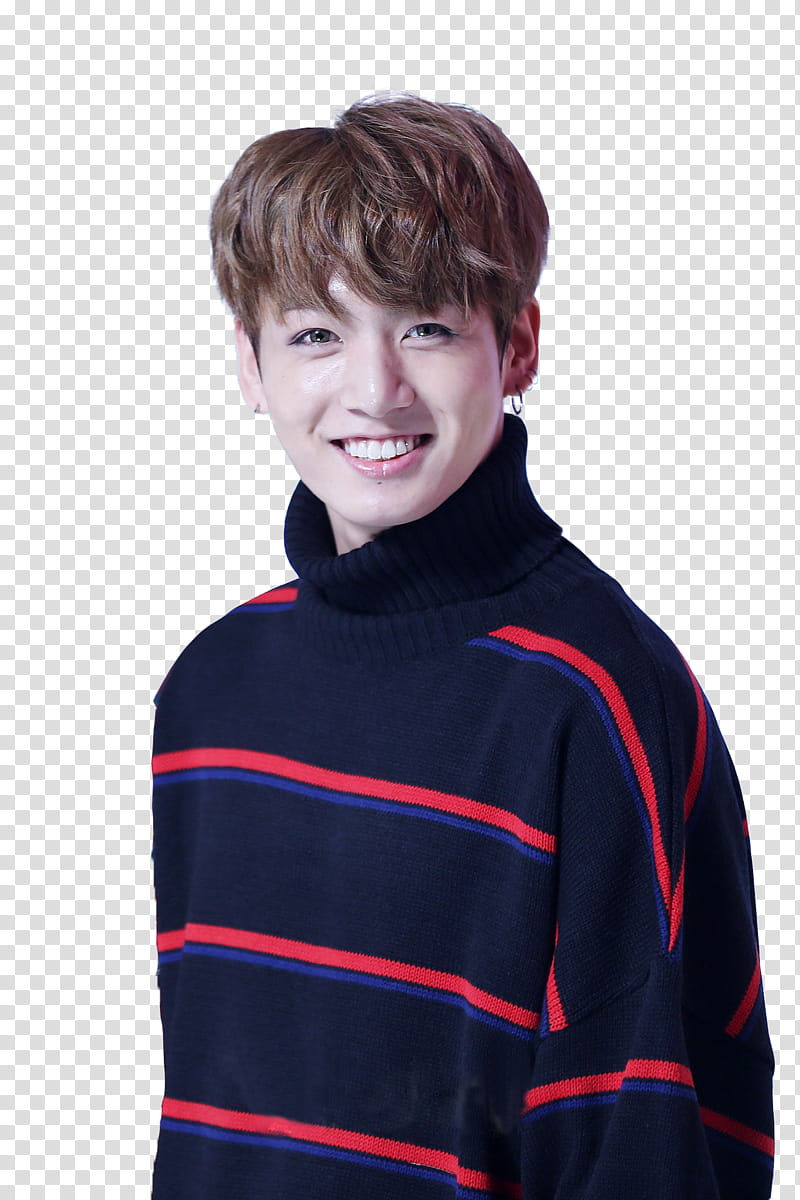 Jungkook from BTS wearing black, red, and blue striped sweater standing and smiling transparent background PNG clipart