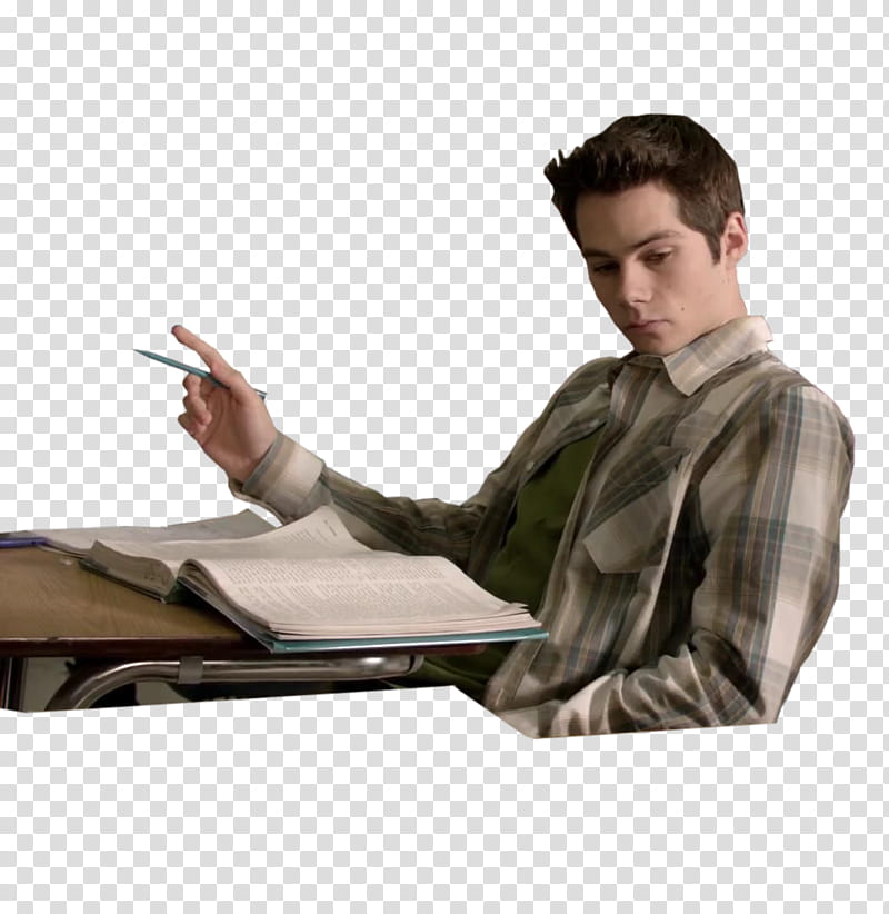 Sterek S Ep , sitting Dylan O'brien while reading book and holding pen in front of desk transparent background PNG clipart