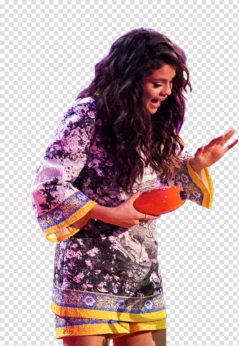 Selena Gomez, smiling Selena Gomez stranding and holding orange case transparent background PNG clipart