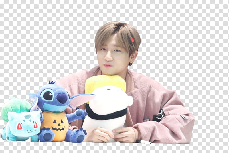 I M MONSTA X , man holding pokemon stuff toys transparent background PNG clipart