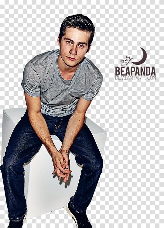 Dylan O Brien, man sitting on white box wearing gray crew-neck t-shirt transparent background PNG clipart