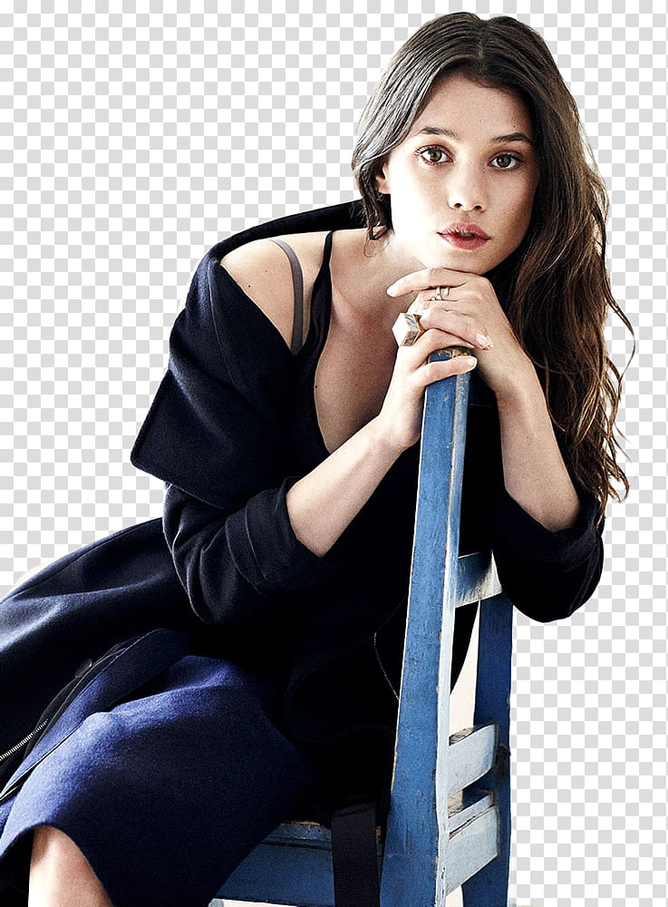 astrid berges frisbey , woman in black coat sits on blue chair transparent background PNG clipart