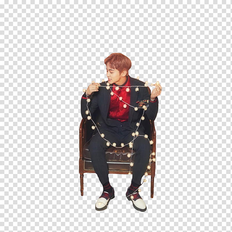 NCT DREAM JOY, man sitting and holding string lights on chair transparent background PNG clipart