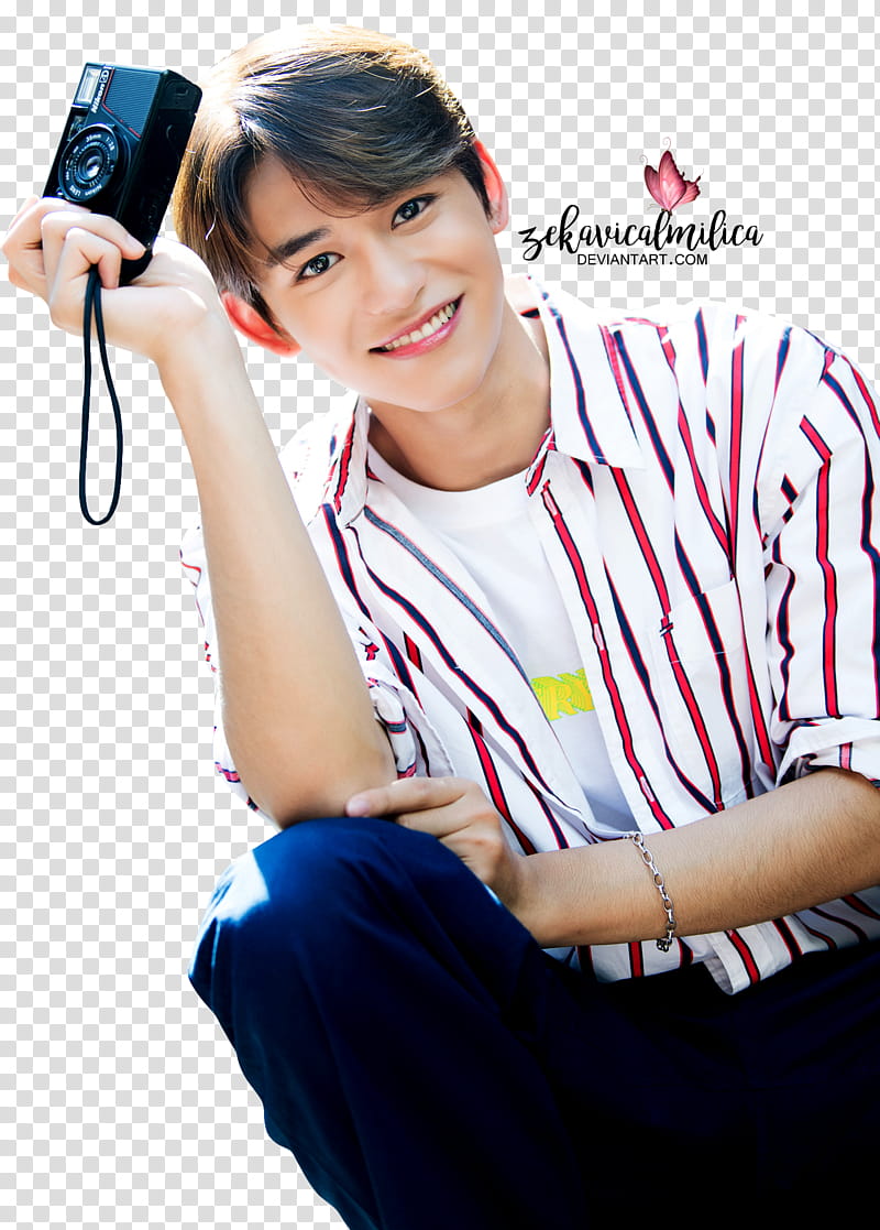 NCT Lucas , man holding black camera while smiling transparent background PNG clipart