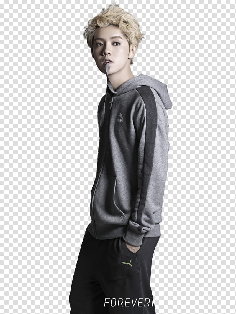 Luhan, man biting lace wearing puma hoodie and bottoms transparent background PNG clipart