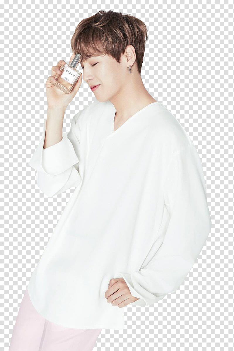 WANNA ONE Clean, man wearing white long-sleeved shirt while holding fragrance bottle transparent background PNG clipart