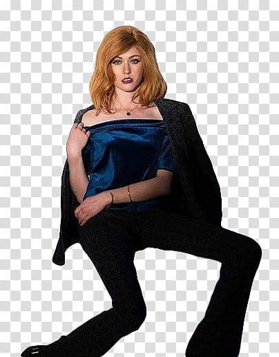 KAT MCNAMARA, woman sitting while holding black coat transparent background PNG clipart