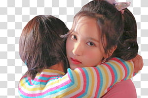 TWICE HEART SHAKER BEHIND THE STAGE , woman in multicolored striped top hugging woman in pink top transparent background PNG clipart thumbnail