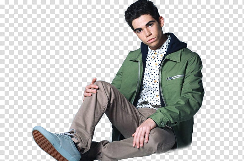 Cameron Boyce, man sitting while holding right knee transparent background PNG clipart