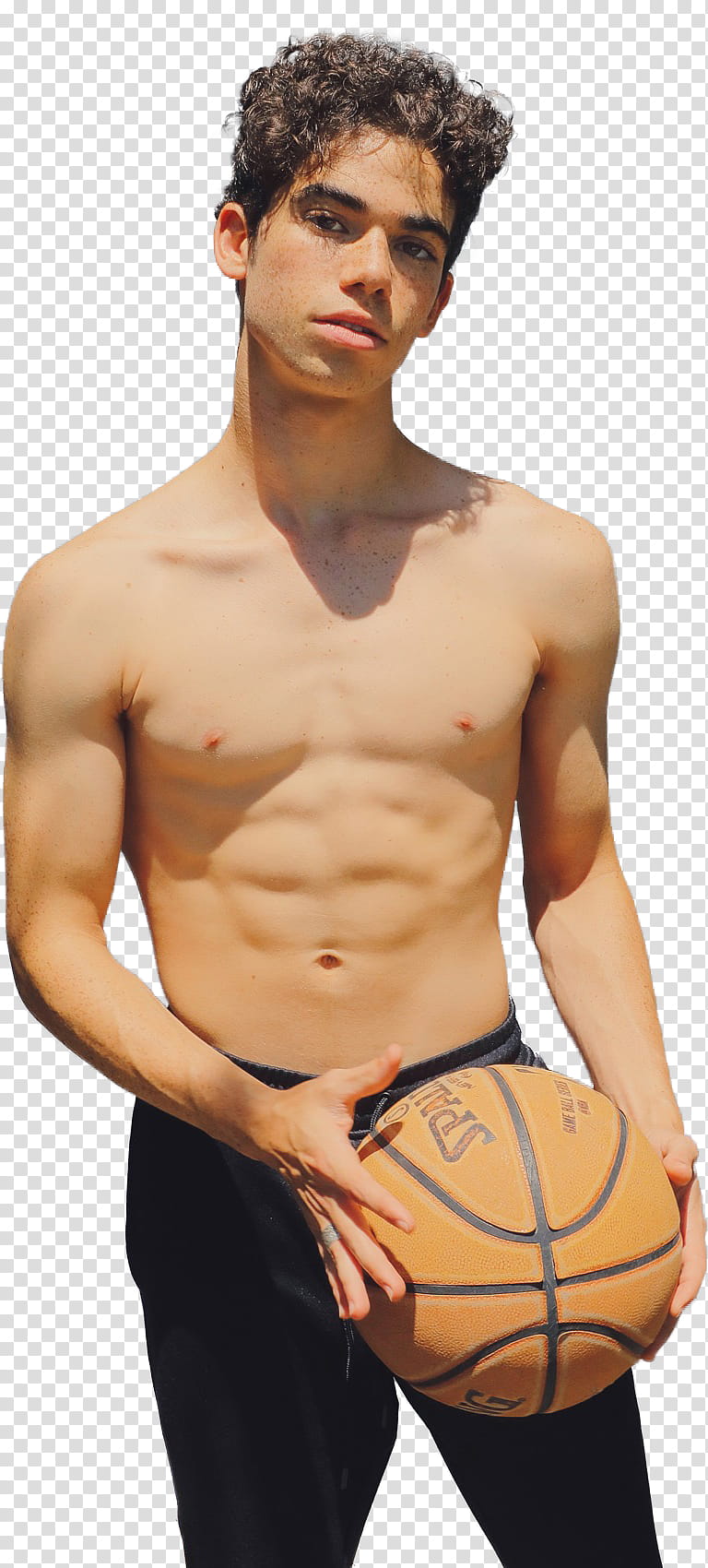 Cameron Boyce, standing man holding brown basketball transparent background PNG clipart