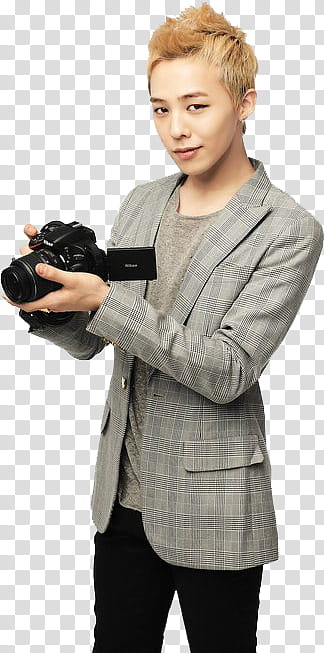 All my GD s, standing G-Dragon holding camera wearing gray suit and black pants transparent background PNG clipart