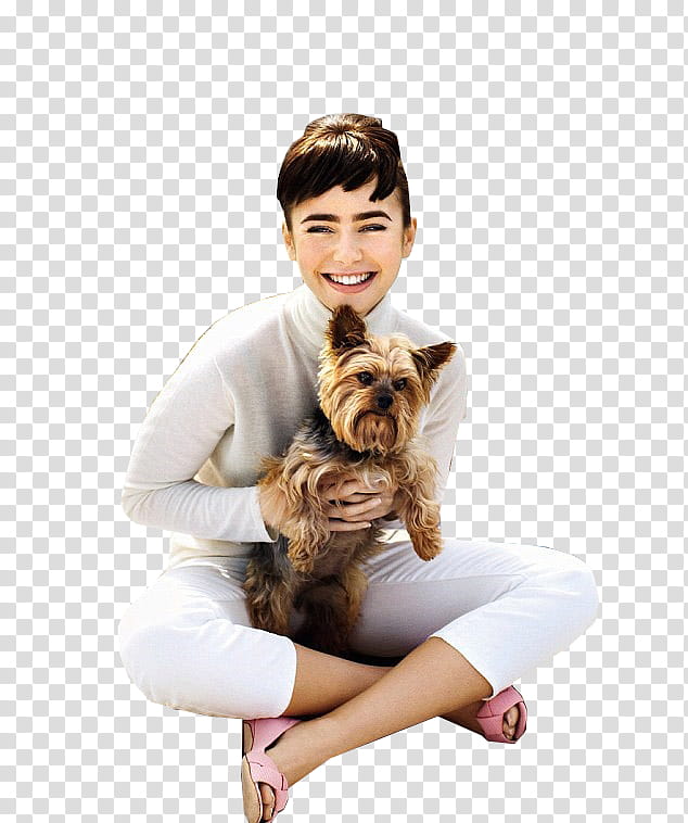 Lily Collins, Audrey Hepburn smiling holding brown dog transparent background PNG clipart