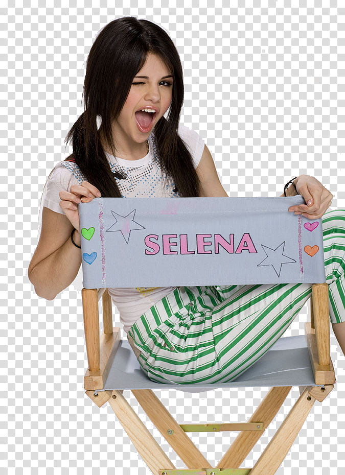 Selena Gomez S, Selena Gomez sitting on Selena-printed director's chair while winking transparent background PNG clipart