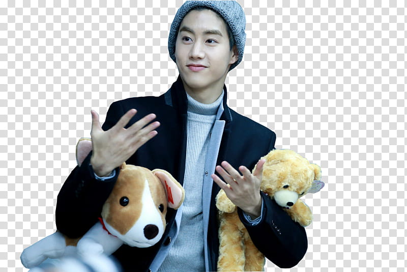 Mark Tuan GOT, man standing while holding brown and white bear and dog plush toys transparent background PNG clipart