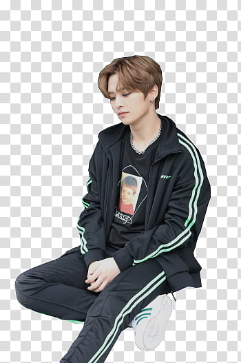 Minho wearing black and white zip-up jacket sitting and looking down transparent background PNG clipart