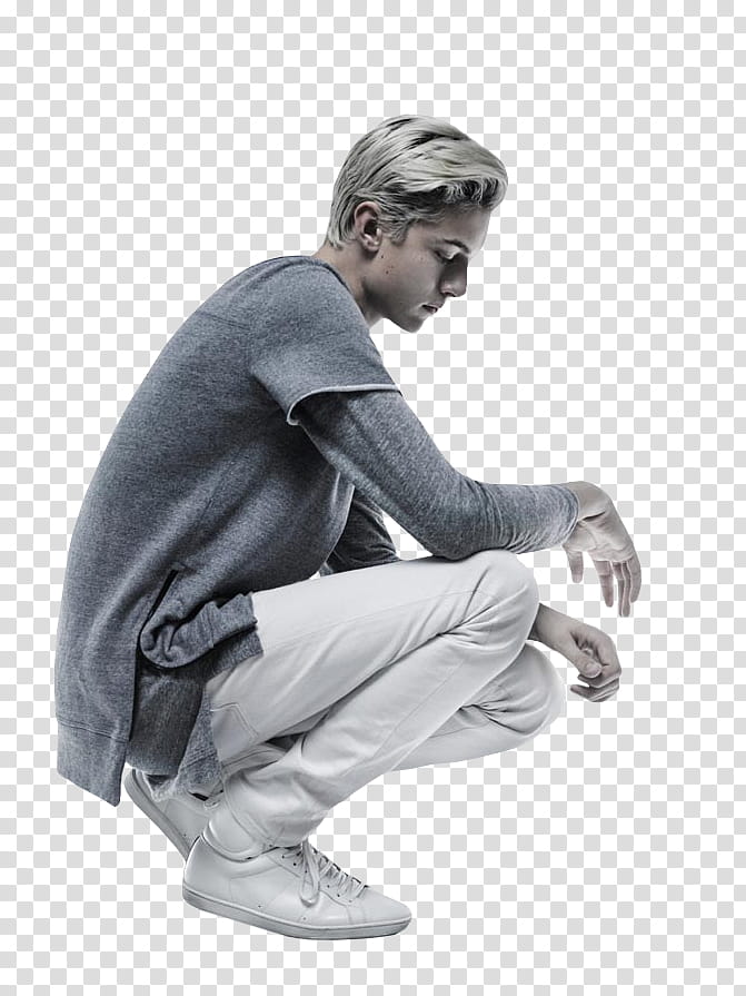 Lucky Blue Smith , man in gray long-sleeved shirt sitting on ground transparent background PNG clipart
