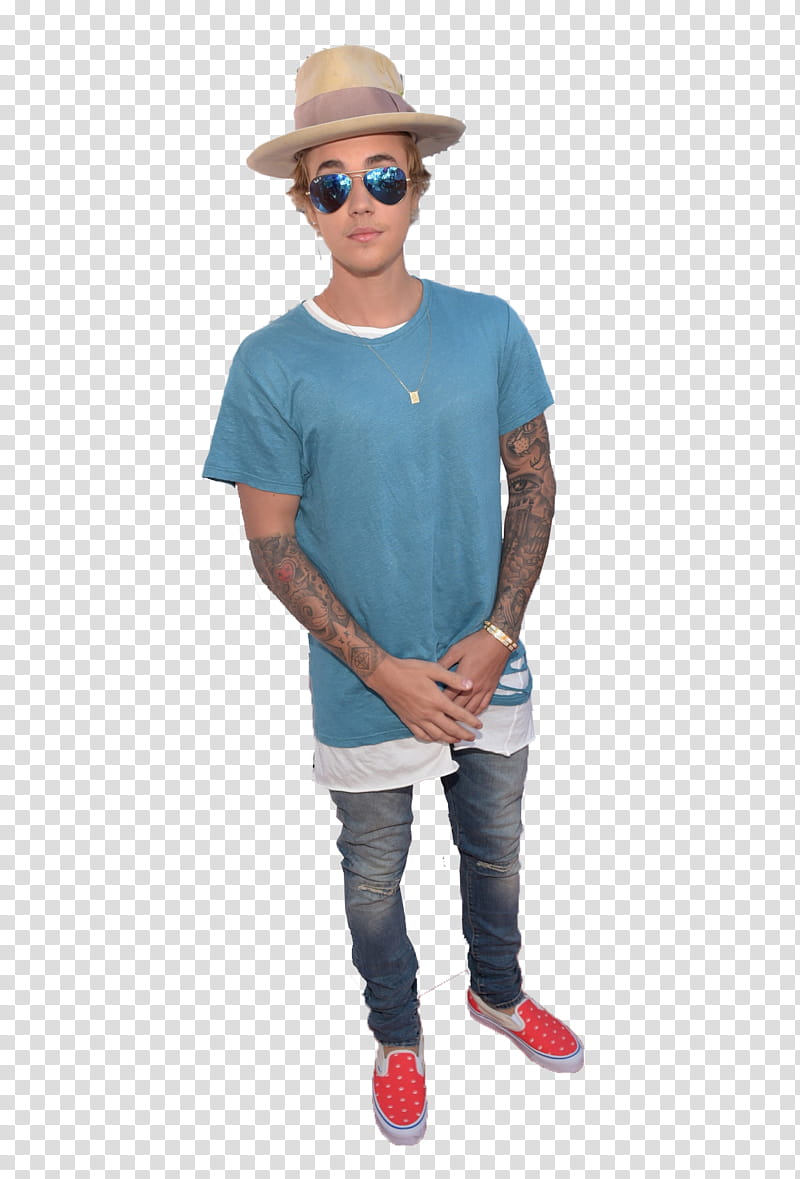 Justin Bieber, man in blue crew-neck t-shirt and blue denim jeans standing transparent background PNG clipart