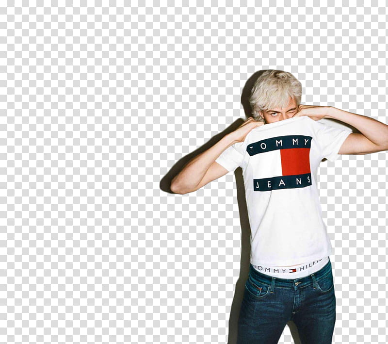 LUCKY BLUE SMITH, man holding white, red, and black Tommy Hilfiger shirt transparent background PNG clipart