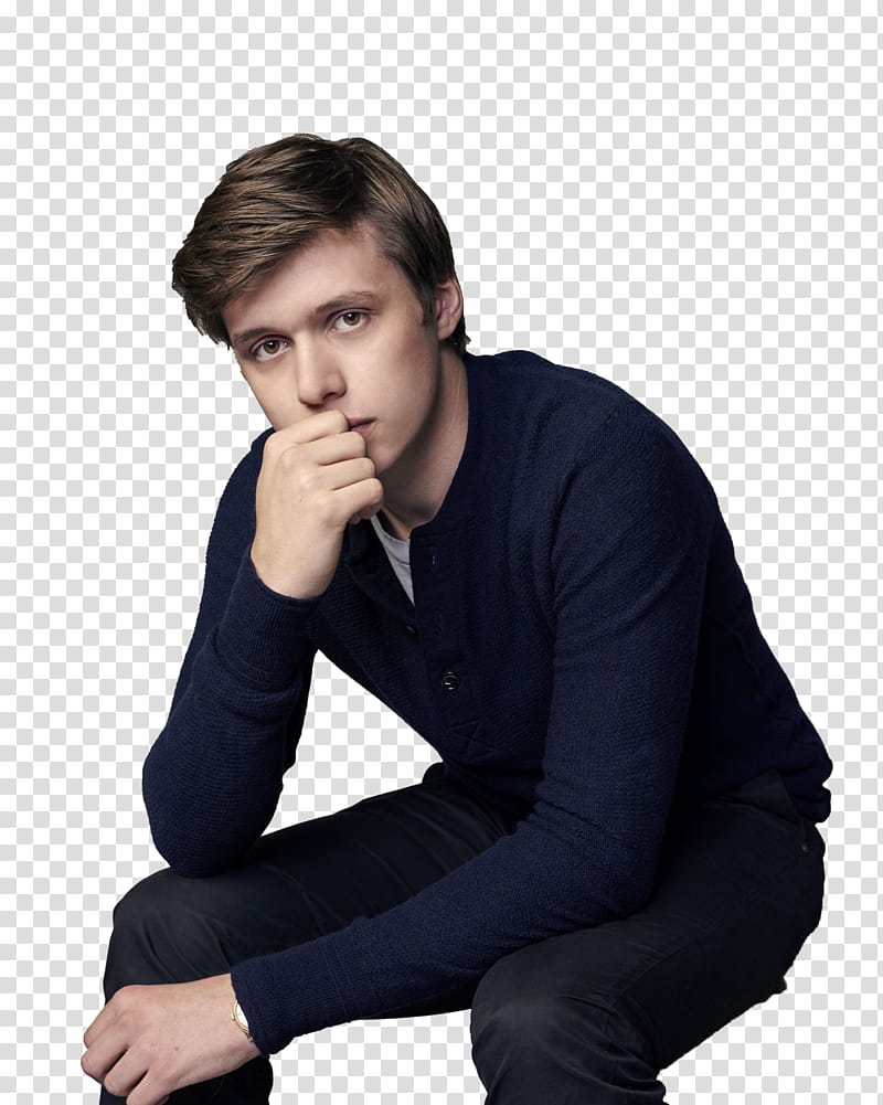 Nick Robinson sitting on white surface transparent background PNG clipart