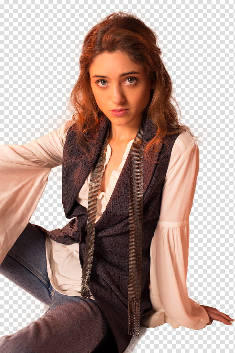 Natalia Dyer, woman wearing blue pants sitting transparent background PNG clipart