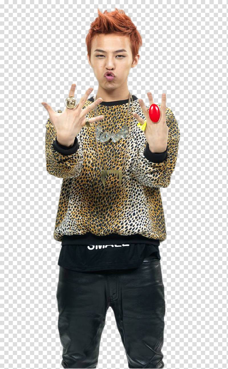 G Dragon Big Bang , man wearing brown leopard print sweater and black pants transparent background PNG clipart