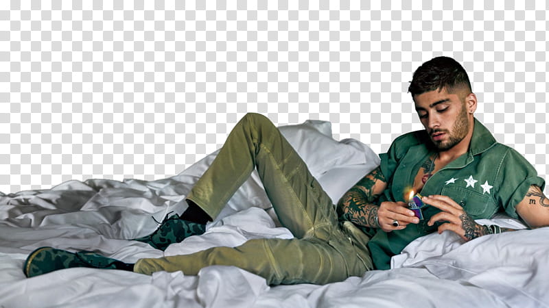 ZAYN, man lying on comforter transparent background PNG clipart