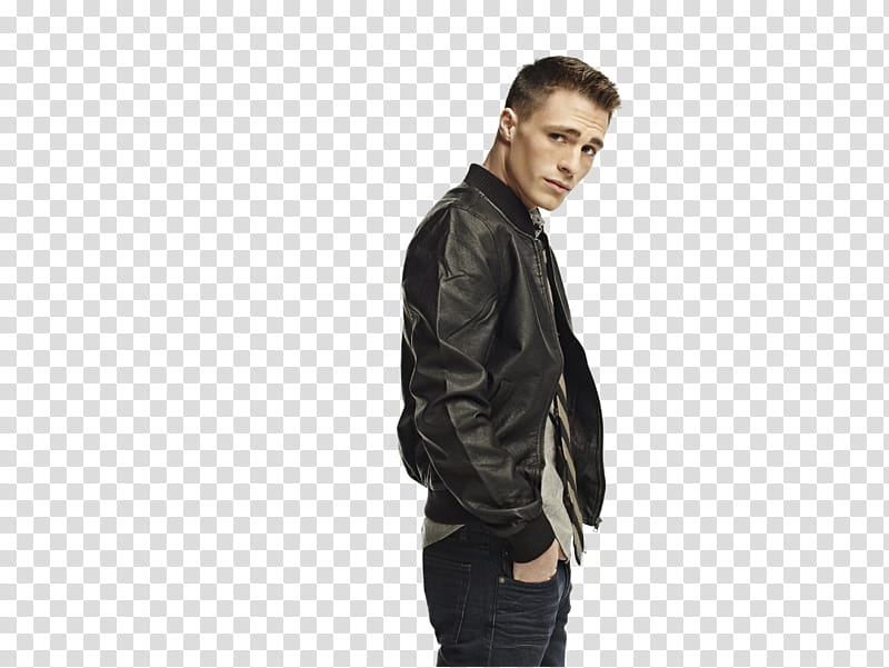 Colton Haynes, standing man wearing black leather bomber jacket while hands in pocket transparent background PNG clipart