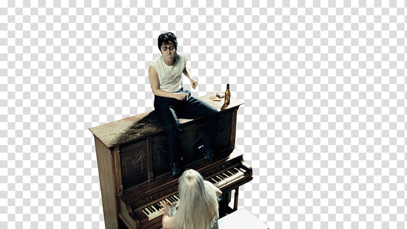 Lady Gaga , man sitting on brown upright piano transparent background PNG clipart