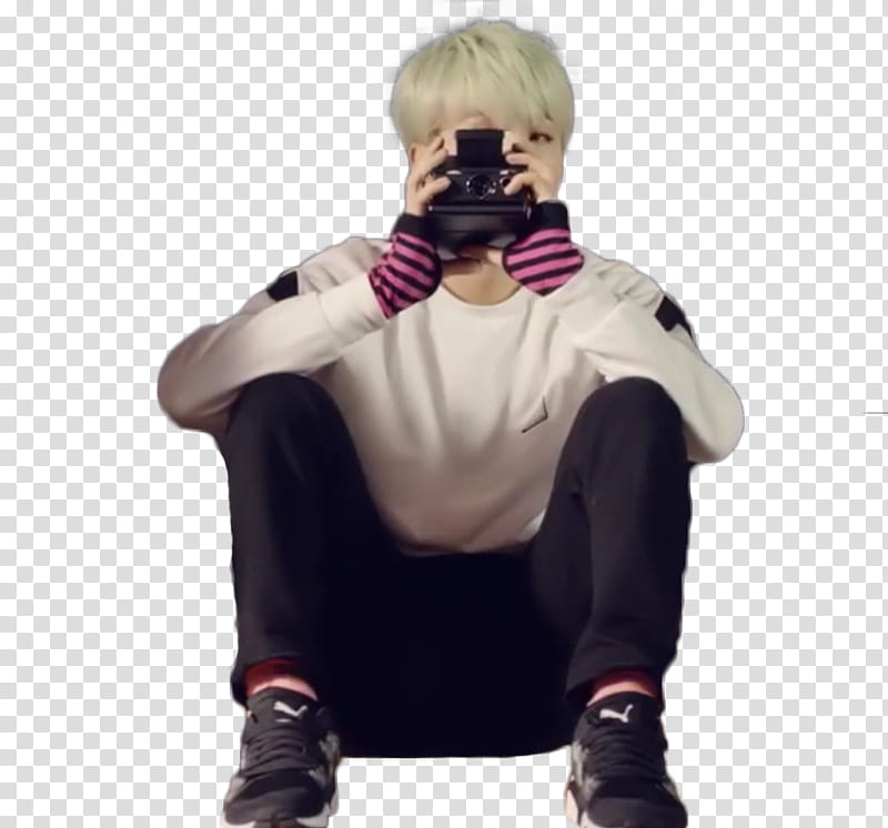 min yoongi , man holding instant camera transparent background PNG clipart