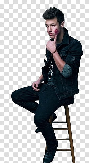 CAMERON DALLAS, man sitting on brown stool transparent background PNG clipart