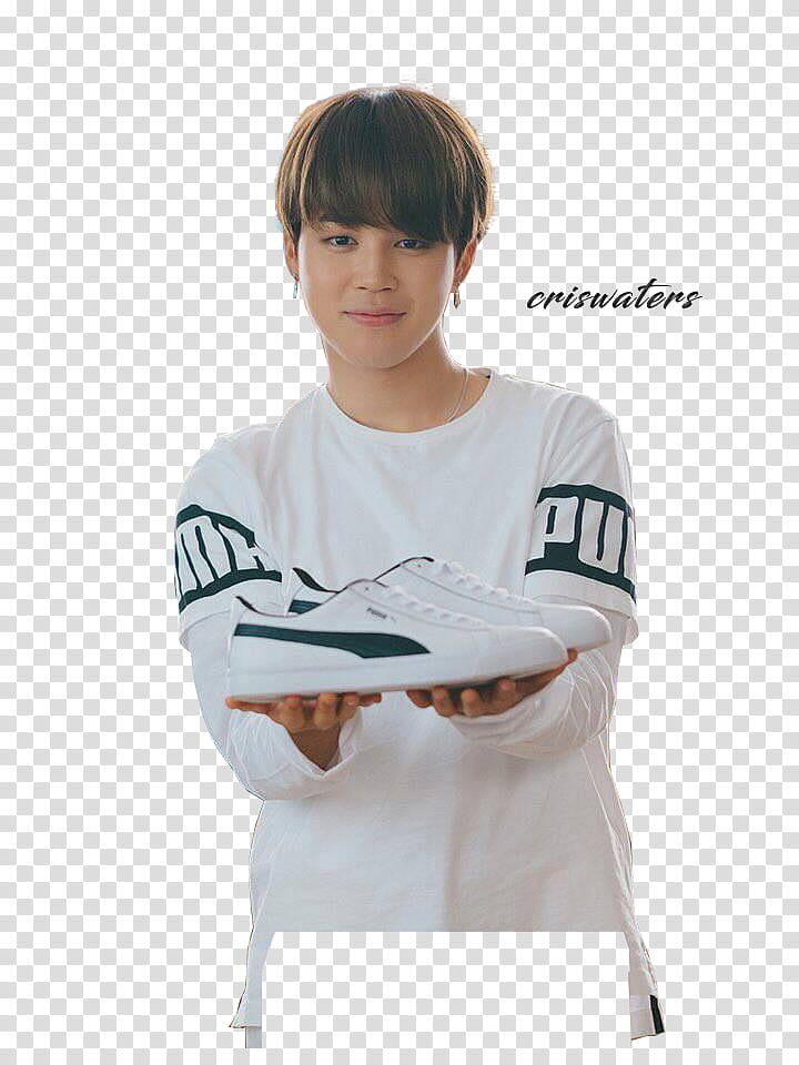 BTS for PUMA, person holding pair of white Puma shoes transparent background PNG clipart